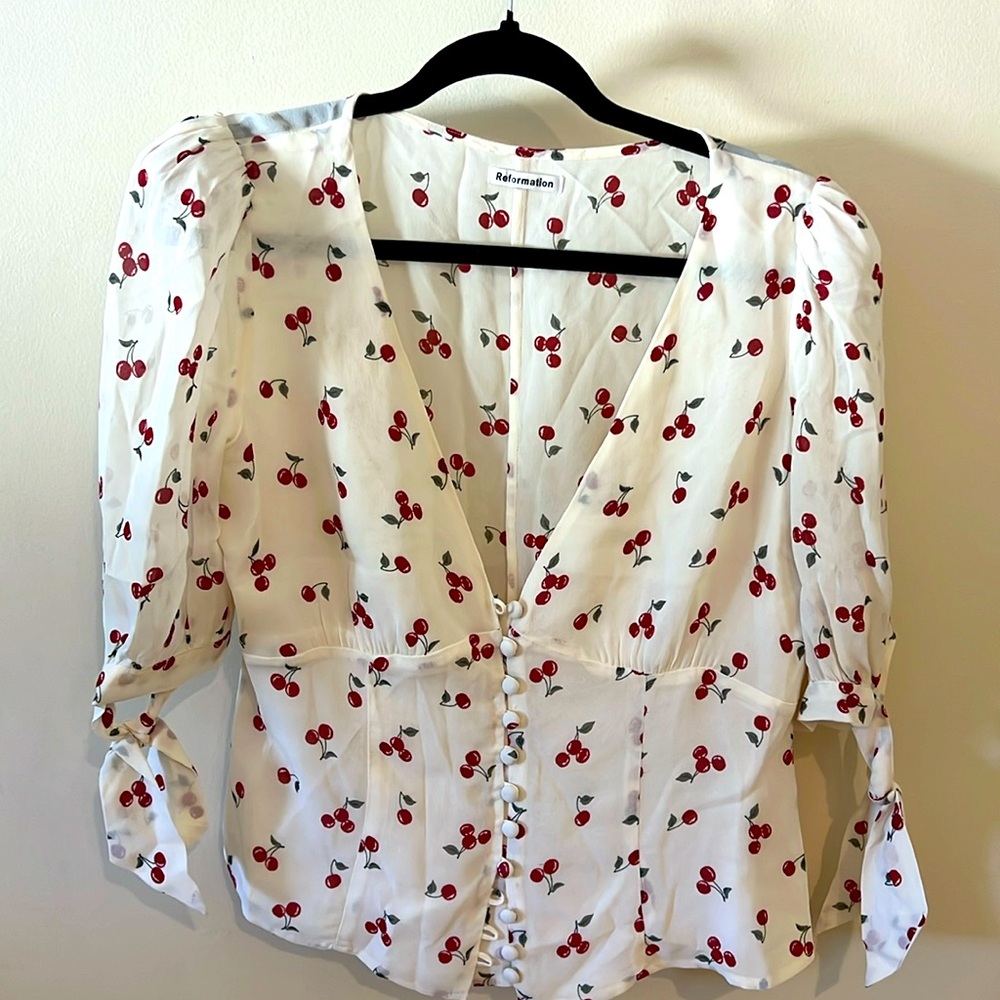 Reformation cherry blouse. Size 10